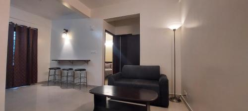 Posezení v ubytování Tranquil Serviced Apartments