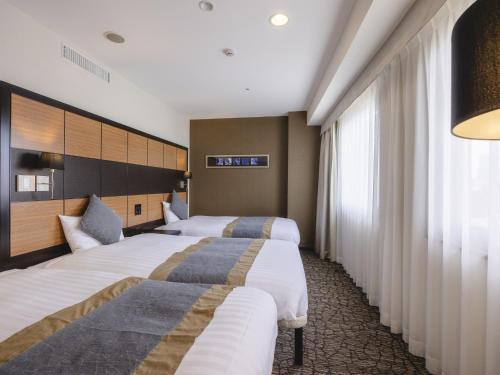 Katil atau katil-katil dalam bilik di Hotel Wing International Premium Tokyo Yotsuya
