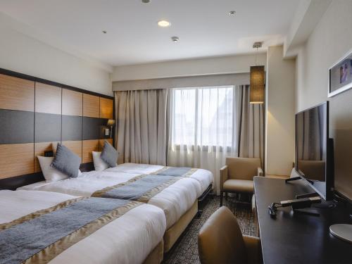 Katil atau katil-katil dalam bilik di Hotel Wing International Premium Tokyo Yotsuya