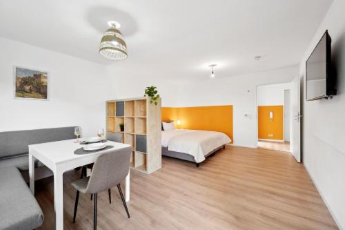 Ένα ή περισσότερα κρεβάτια σε δωμάτιο στο Wohnung in Welzheim, Balkon, Parkplatz, 6 Betten, Smart TV