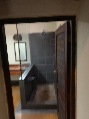 a bathroom with a shower with a glass door at Leriba Lodge Unit425 in Phalaborwa