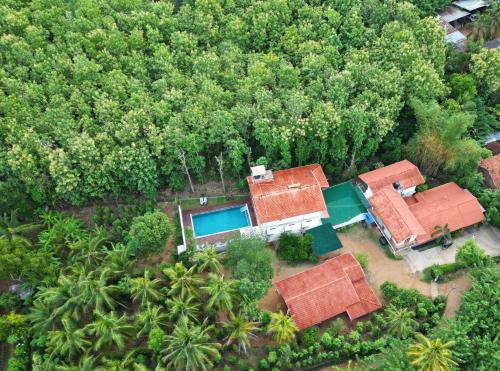 an aerial view of a house with a swimming pool at Nature House in Udawalawe