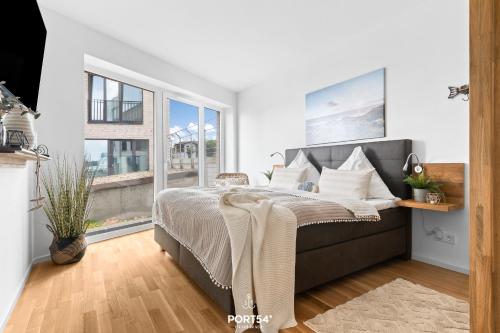 Postel nebo postele na pokoji v ubytování Ferienwohnung Schleiquartier Kappeln