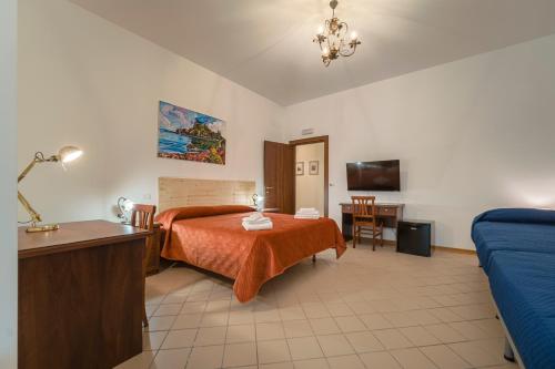 Katil atau katil-katil dalam bilik di IL VIVAIO Bed and Breakfast