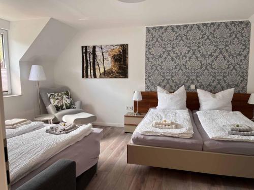 Postel nebo postele na pokoji v ubytování ITH Apartments