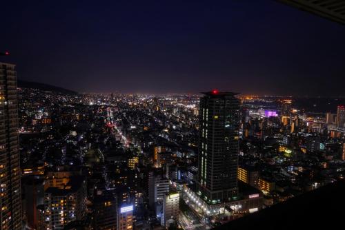 a view of a city at night at ANA Crowne Plaza Kobe by IHG in Kobe