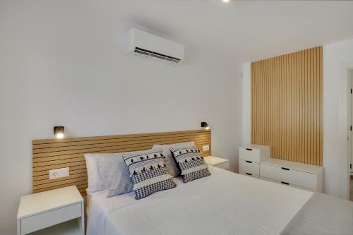 Ένα ή περισσότερα κρεβάτια σε δωμάτιο στο Martina's Suite Vacation