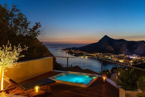 Casa Vita featuring a sea view, billiards, and heated pool
