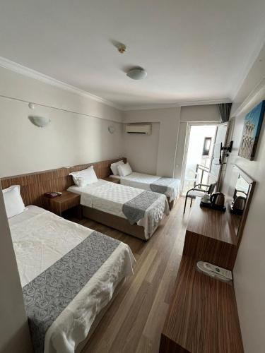 Ένα ή περισσότερα κρεβάτια σε δωμάτιο στο Hotel Cenka Ephesus