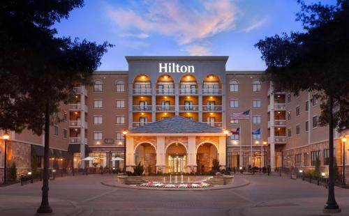 a hotel with a gazebo in front of it at Hilton Dallas Southlake Town Square in Southlake
