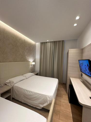 Katil atau katil-katil dalam bilik di Hb Hotels Orchidea Blu