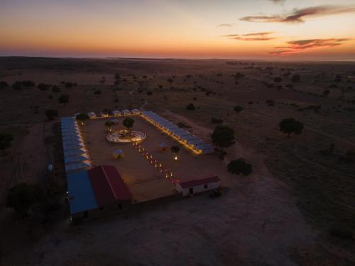 an aerial view of a train station at sunset at Royal Pavilion Camps by ShriGo Hotels in Sām