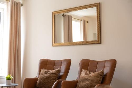 Χώρος καθιστικού στο The Duplex Apartment