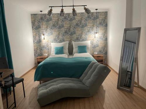Posteľ alebo postele v izbe v ubytovaní Réz Apartmanok Gyula