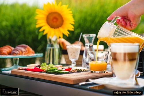 ゲストハウスの敷地内または近くでの食事または食べ物
