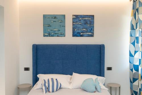 Postel nebo postele na pokoji v ubytování B&B Maiori Suites