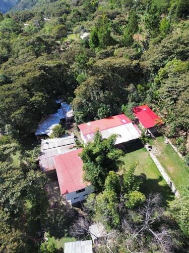 an overhead view of a group of houses on a mountain at Lia B&B Lucmabamba in Sahuayacu