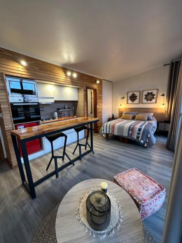Cama o camas de una habitación en Roqueríos Logde, Tinaja incluida, Antuco