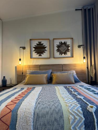 Cama o camas de una habitación en Roqueríos Logde, Tinaja incluida, Antuco