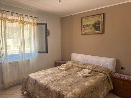 Voodi või voodid majutusasutuse Camera vicino al mare toas