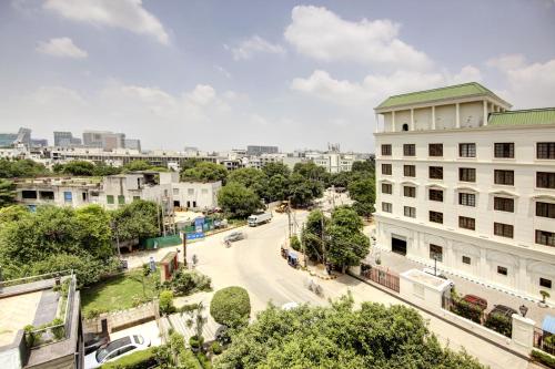 a view of a street in a city with buildings at Saltstayz Premier - Cyber Hub in Gurgaon