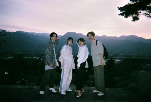 a group of people standing on top of a mountain at Sasamori House in Azumino