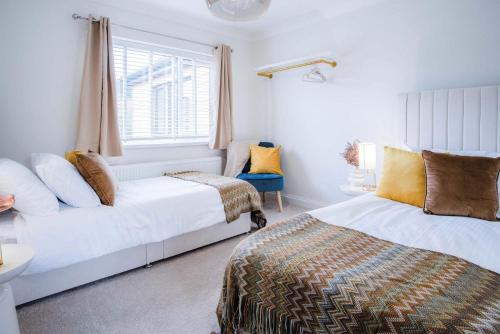 Giường trong phòng chung tại Castell Morlais - Luxurious 5 Bed - Pontsticill