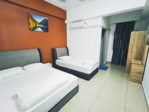 Katil atau katil-katil dalam bilik di Travelers HomestySitiawan b-30-6 The Venus Aparment