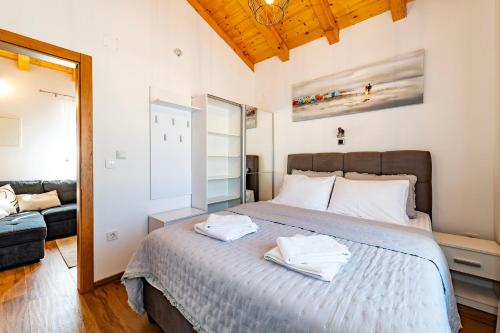 Ένα ή περισσότερα κρεβάτια σε δωμάτιο στο Villa Lunis