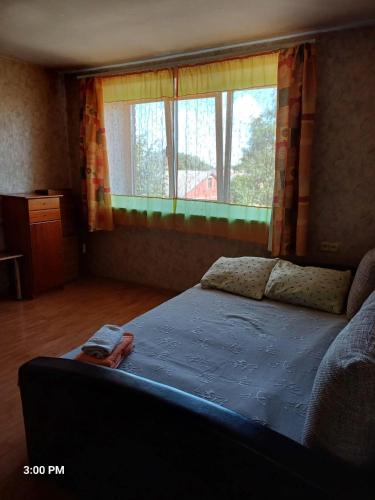 Кровать или кровати в номере Meza Apartment