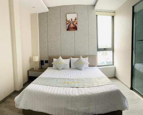 Postel nebo postele na pokoji v ubytování Amely Hotel