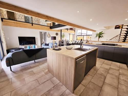 Χώρος καθιστικού στο Loft de Magnac, spacieux et moderne