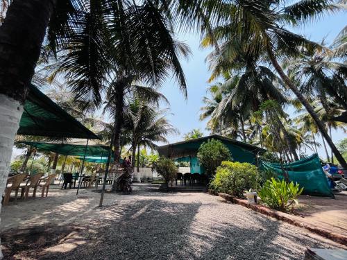 Zahrada ubytování Nisarg farm house beach resort Kashid