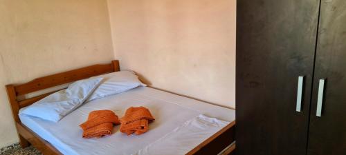 Ένα ή περισσότερα κρεβάτια σε δωμάτιο στο Veranda Rooms to Let