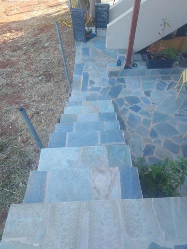 a set of stone steps with a heart painted on them at Dina in Palaiá Fókaia