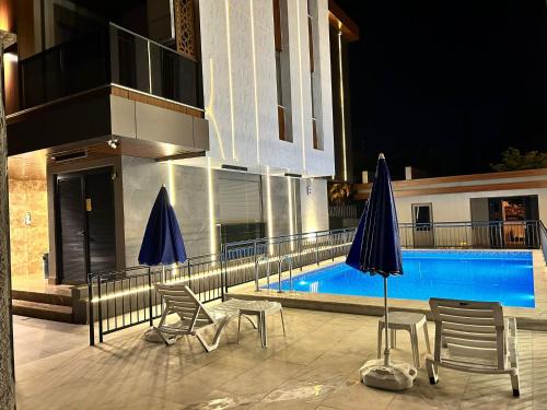 Πισίνα στο ή κοντά στο Grand Diker Port Residence