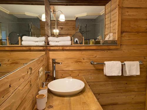 a bathroom with a sink and a mirror at Ruhige und einladende Wohnung in Leutasch in Leutasch