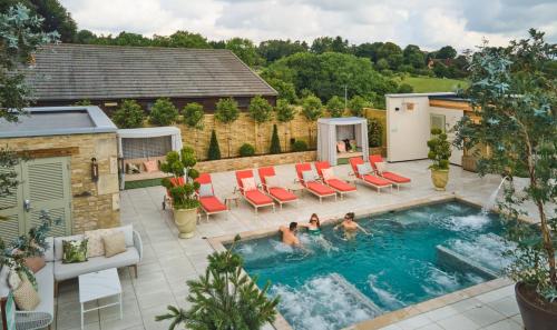a group of people in a swimming pool at Homewood Hotel & Spa - Small Luxury Hotels of the World in Bath