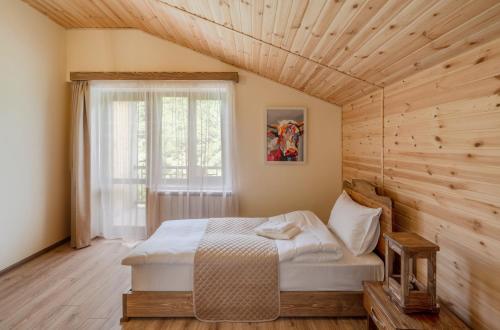 Postel nebo postele na pokoji v ubytování Jean Chardin Dilijan