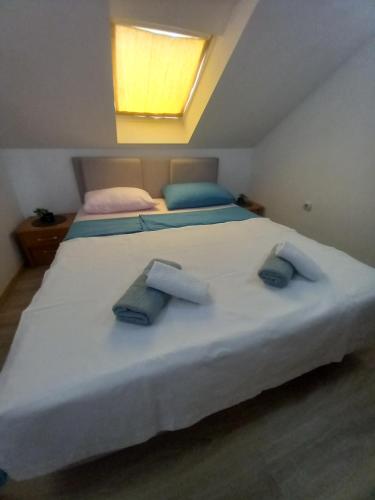 Katil atau katil-katil dalam bilik di Apartman Promenade Mostar