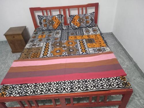 Postel nebo postele na pokoji v ubytování BG Guest House Jaffna