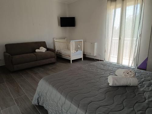 Postel nebo postele na pokoji v ubytování Scanio's House