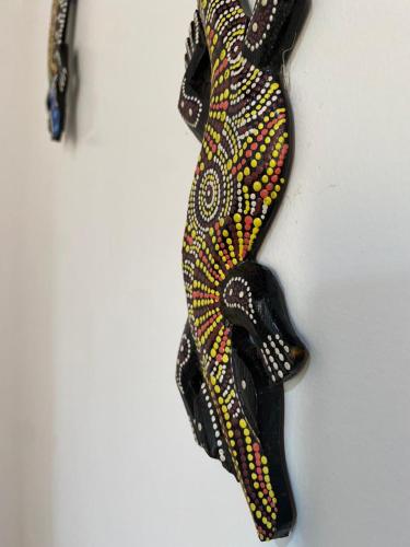 a snake hanging on a wall at Pousada Oceano Atlântico in Marau