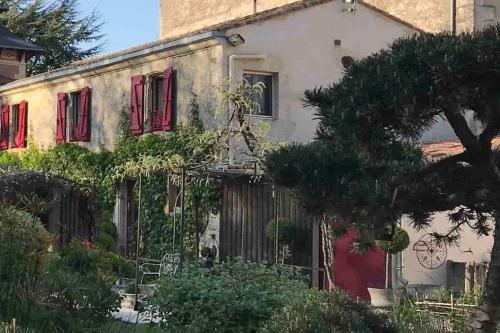 Κήπος έξω από το Gîte de la Villa André