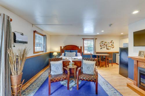 a living room with a table and chairs at Historic Boise Studio with Courtyard, Blocks to Dtwn in Boise