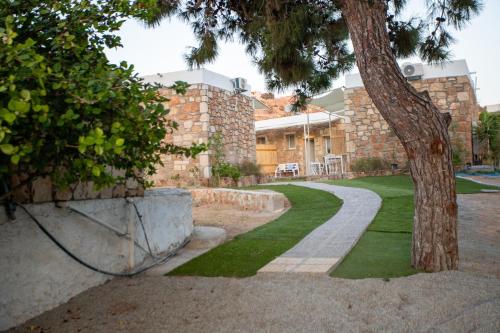 Taman di luar il Melograno Studios Pefkos Lindos