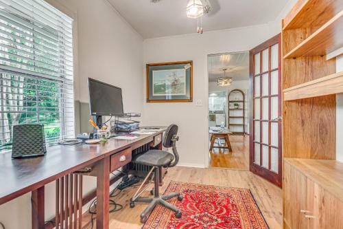an office with a desk with a computer on it at Charming Fairhope Home about 2 Mi to North Beach Park! in Fairhope