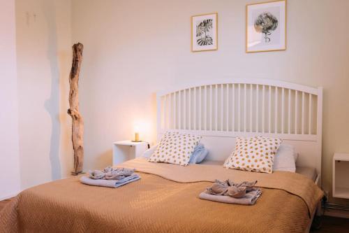 Postel nebo postele na pokoji v ubytování Cozy Bungalow inklusive free parking