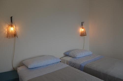 A bed or beds in a room at Villa mare blu al Ciolo