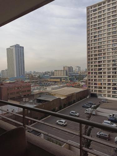 a view of a city from a balcony of a building at Terminal Dpto Estación Central Equipado in Santiago